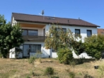 Außenansicht - Freistehendes Einfamilienhaus mit ELW – 1.165 m² Grundstück und freie Aussicht