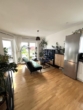Wohnzimmer - Sonnige Penthouse-Wohnung mit zwei Dachterrassen und Weitblick – ein Zuhause mit Perspektive!