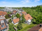 Luftaufnahme - Design trifft Lage! Frei stehendes Familiendomizil in stadtnaher Lage in Top-Zustand!