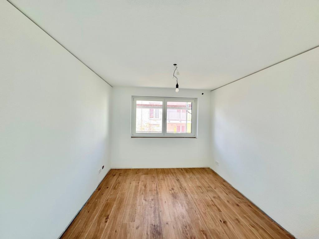 Wohntraum! Hochwertige 3 Zimmer-Neubauwohnung mit Balkon & Aufzug! - Schlafzimmer (41303)