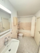 Badezimmer - Licht, Lage, Lebensqualität – Charmante 2-Zimmer-Erdgeschosswohnung mit Sonnenbalkon!
