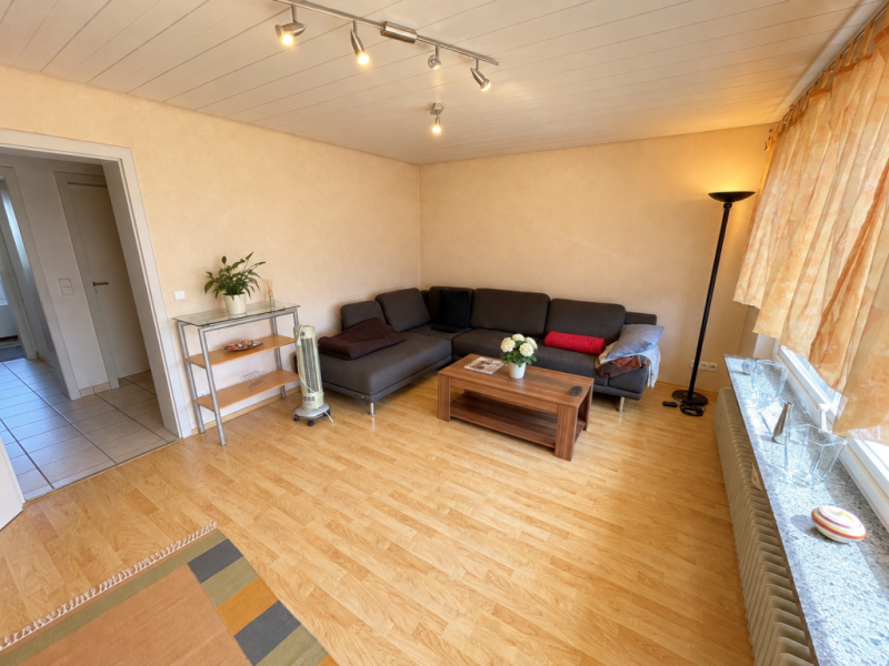 Generationsglück genießen! Attraktives Zweifamilien-Doppelhaus in Köngen! - Wohnzimmer (EG) (54181)