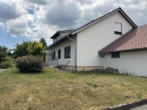 Aussen 3 - Frisch renovierte 4 Zimmer-Wohnung im EG mit eigenem, großen Garten!