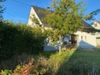Blick Vorderseite - Freistehendes Einfamilienhaus in beliebter Wohnlage mit schönem Garten - Das Familiendomizil!